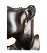 Orecchini in oro 18 carati con smeraldi e diamanti