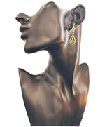 Orecchini in oro 18 carati con smeraldi e diamanti