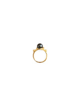Anello in oro con diamante e perla nera