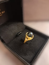 Anello in oro con diamante e perla nera